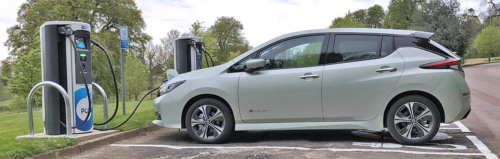 How do electric charging points reduce eco-pollution?